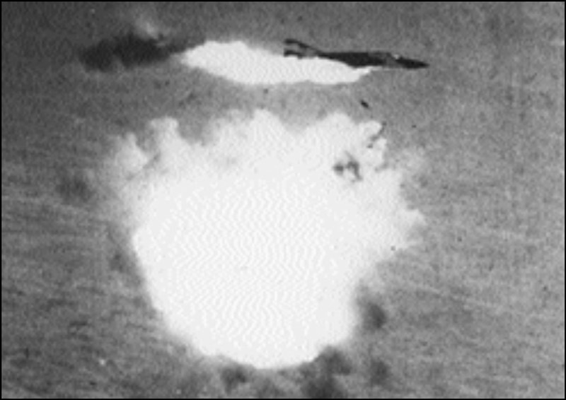 Photo showing the detonation of a SA-2 missile underneath an F-4 Phantom II, unknown date. (U.S. Air Force)